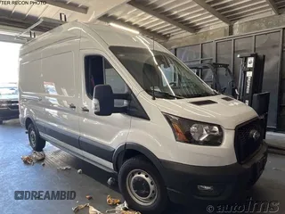 2023 Ford Transit Cargo with VIN 1FTBR1X83PKC02653, listed as a IAAI auction lot 42789310 with 242 mi miles and . Bid and sale history available at DreamBid. Image 2.