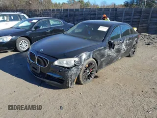 2015 BMW 7 Series 750Li xDrive with VIN WBAYF8C56FD654698, listed as a IAAI auction lot 41229313 with 120,238 mi miles and . Bid and sale history available at carsss.com. Image 2.