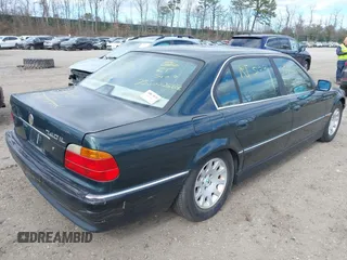 2000 BMW 7 Series 740iL with VIN WBAGH8343YDP13075, listed as a IAAI auction lot 42050589 with 999,999 mi miles. Bid and sale history available at carsss.com. Image 4.