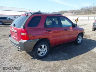 2007 Kia Sportage LX with VIN KNDJF724477445886, listed as a IAAI auction lot 41778532 with 253,979 mi miles. Bid and sale history available at carsss.com. Image 4.