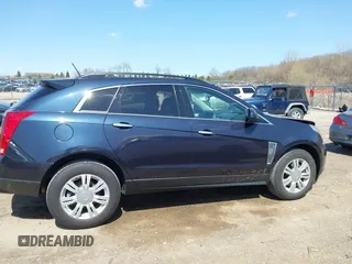2015 Cadillac SRX with VIN 3GYFNAE39FS571065, listed as a IAAI auction lot 42029749 with 146,098 mi miles and . Bid and sale history available at DreamBid. Image 13.