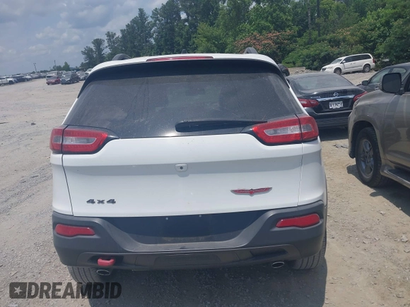 2015 Jeep Cherokee Trailhawk z VIN 1C4PJMBS3FW511564, wystawiony jako IAAI lot #42424468 z przebiegiem 169 167 mil mil oraz . Historia ofert i sprzedaży dostępna na DreamBid. Obrazek 16.