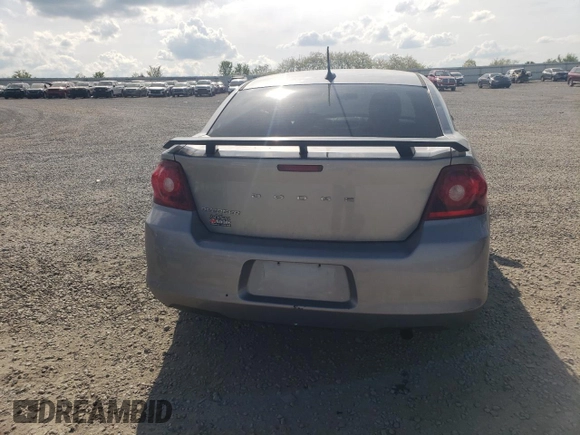 2014 Dodge Avenger SE z VIN 1C3CDZAB9EN126846, wystawiony jako Copart lot #54504155 z przebiegiem 144 352 mil mil oraz Szkoda całkowita • Salvage title. Historia ofert i sprzedaży dostępna na DreamBid. Obrazek 6.