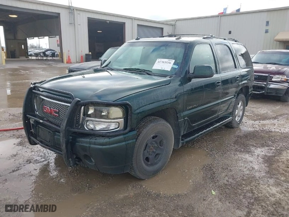 2003 GMC Yukon Denali with VIN 1GKEK63U13J206304, listed as a IAAI auction lot 41703536 with 224,781 mi miles. Bid and sale history available at carsss.com. Image 2.