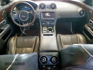 2014 Jaguar XJ Portfolio with VIN SAJWA2GZ2E8V64993, listed as a Copart auction lot 88774965 with 78,689 mi miles and Salvage title. Bid and sale history available at DreamBid. Image 8.