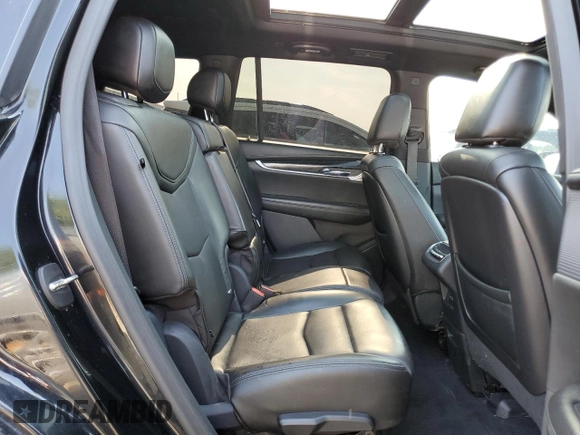 2020 Cadillac XT6 FWD Premium Luxury с VIN 1GYKPCRSXLZ174002, выставлен на аукционе Copart как лот 52083235 с пробегом 79 712 миль миль и Списание • Salvage title. История ставок и продаж доступна на DreamBid. Изображение 11.