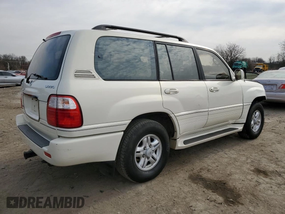 2000 Lexus LX 470 z VIN JT6HT00W8Y0126253, wystawiony jako Copart lot #49400665 z przebiegiem 181 328 mil mil oraz Szkody całkowita. Historia ofert i sprzedaży dostępna na DreamBid. Obrazek 3.