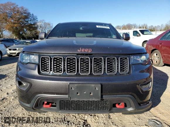 2021 Jeep Grand Cherokee Trailhawk with VIN 1C4RJFLG5MC627975, listed as a Copart auction lot 83080204 with 83,642 mi miles and Salvage Title. Bid and sale history available at carsss.com. Image 5.
