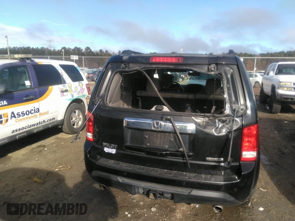 2012 Honda Pilot Touring with VIN 5FNYF3H90CB035309, listed as a IAAI auction lot 41063215 with 228,081 mi miles and . Bid and sale history available at carsss.com. Image 17.