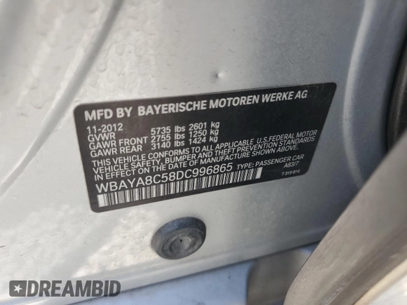 2013 BMW 7 Series 750i with VIN WBAYA8C58DC996865, listed as a Copart auction lot 61831294 with 151,238 mi miles and Salvage Title. Bid and sale history available at DreamBid. Image 12.