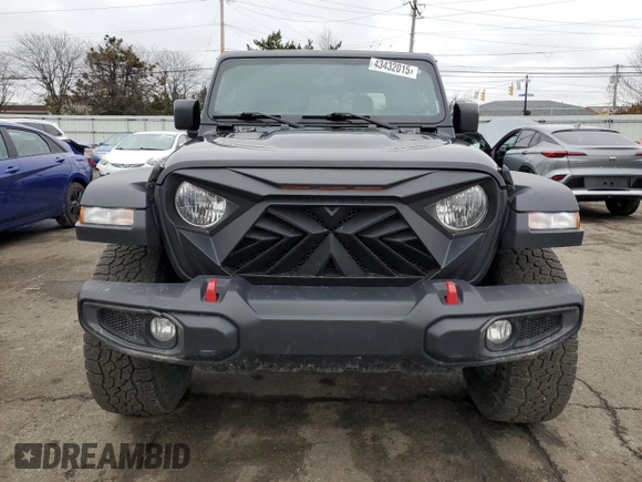 2023 Jeep Gladiator Rubicon with VIN 1C6JJTBG6PL500516, listed as a Copart auction lot 43432015 with 107,096 mi miles and Salvage title. Bid and sale history available at DreamBid. Image 5.