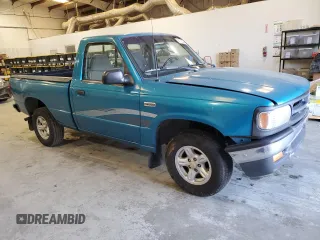 1996 Mazda B-Series 2WD Truck with VIN 4F4CR12A2TTM30539, listed as a Copart auction lot 82702234 with 115,724 mi miles and Salvage Title. Bid and sale history available at carsss.com. Image 4.