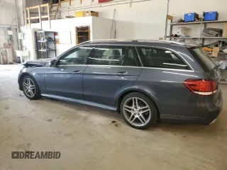 2015 Mercedes-Benz E 350 Luxury with VIN WDDHH8JB0FB134830, listed as a Copart auction lot 70855934 with 106,717 mi miles and Salvage title. Bid and sale history available at DreamBid. Image 2.