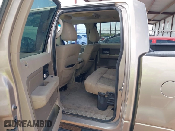 2006 Ford F-150 XLT with VIN 1FTRW12W26KD43273, listed as a IAAI auction lot 42153933 with 183,771 mi miles. Bid and sale history available at carsss.com. Image 8.