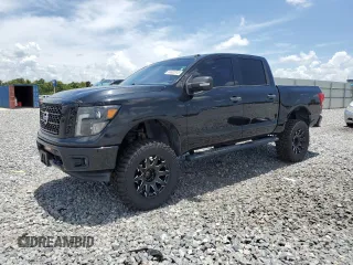 2018 Nissan Titan SV with VIN 1N6AA1E57JN515767, listed as a Copart auction lot 63330315 with 51,653 mi miles and Salvage title. Bid and sale history available at DreamBid. Image 1.