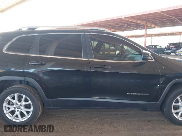 2015 Jeep Cherokee Latitude with VIN 1C4PJLCB8FW669150, listed as a IAAI auction lot 42122669 with 194,525 mi miles and . Bid and sale history available at DreamBid. Image 13.
