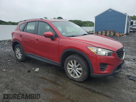 2016 Mazda CX-5 Sport with VIN JM3KE4BY1G0768530, listed as a Copart auction lot 60521795 with 118,132 mi miles and Salvage title. Bid and sale history available at DreamBid. Image 4.