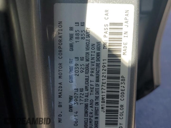 2014 Mazda 3 i SV with VIN JM1BM1T77E1212911, listed as a Copart auction lot 43633875 with 118,511 mi miles and Salvage Title. Bid and sale history available at DreamBid. Image 12.
