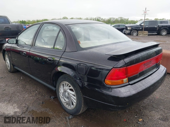 1999 Saturn SL with VIN 1G8ZK5272XZ263163, listed as a IAAI auction lot 42180002 with 138,463 mi miles. Bid and sale history available at carsss.com. Image 3.