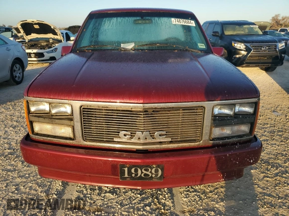 1989 GMC Sierra 1500 with VIN 1GTDC14HXKZ548889, listed as a Copart auction lot 74876684 with 205,365 mi miles and Salvage Title. Bid and sale history available at DreamBid. Image 5.