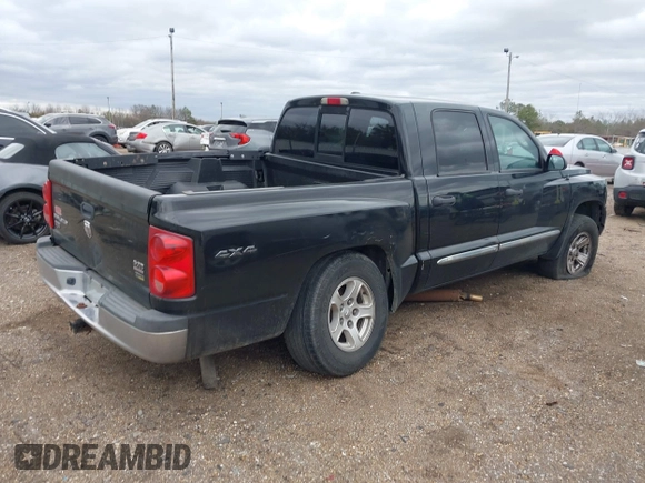 2008 Dodge Dakota Laramie with VIN 1D7HW58NX8S602604, listed as a IAAI auction lot 41717006 with 167,023 mi miles. Bid and sale history available at carsss.com. Image 4.