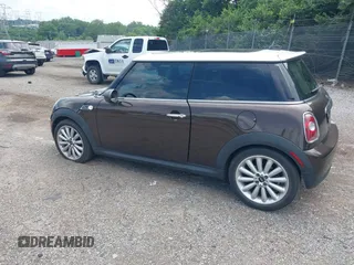 2010 MINI Hardtop with VIN WMWMF3C55ATZ23127, listed as a IAAI auction lot 42667783 with 61,954 mi miles and . Bid and sale history available at DreamBid. Image 3.