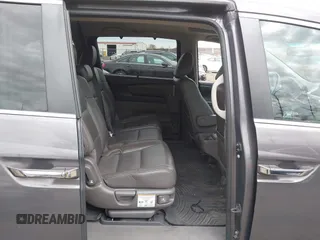 2012 Honda Odyssey EX-L with VIN 5FNRL5H65CB042898, listed as a IAAI auction lot 41784075 with 179,596 mi miles and . Bid and sale history available at carsss.com. Image 8.