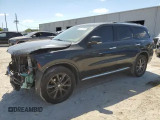 2013 Dodge Durango Crew z VIN 1C4RDHDG6DC691735, wystawiony jako Copart lot #52572285 z przebiegiem 99 505 mil mil oraz Nie do naprawy • Non repairable. Historia ofert i sprzedaży dostępna na DreamBid. Obrazek 1.