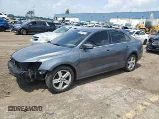 2013 Volkswagen Jetta TDI w/Premium with VIN 3VWLL7AJ6DM440499, listed as a Copart auction lot 60189355 with 148,786 mi miles and Clean title. Bid and sale history available at DreamBid. Image 1.