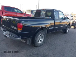 1999 Mazda B-Series 2WD Truck SE with VIN 4F4YR16V8XTM09770, listed as a IAAI auction lot 41416620 with 245,604 mi miles. Bid and sale history available at carsss.com. Image 4.