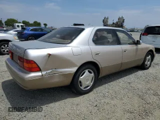 1998 Lexus LS 400 z VIN JT8BH28F1W0138417, wystawiony jako Copart lot #58729785 z przebiegiem 230 777 mil mil oraz Szkoda całkowita • Salvage title. Historia ofert i sprzedaży dostępna na DreamBid. Obrazek 3.
