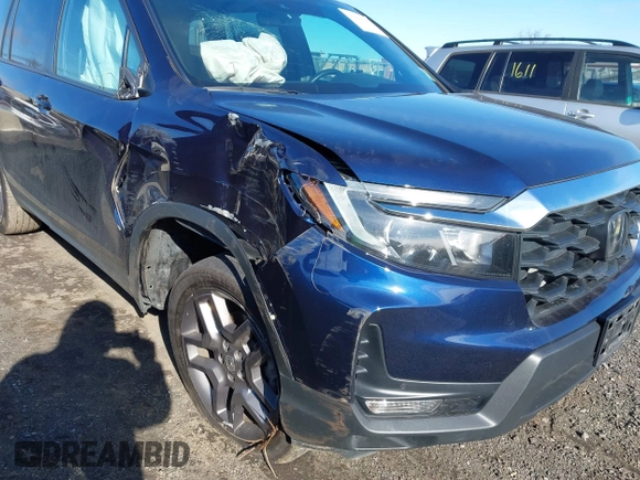 2023 Honda Passport EX-L with VIN 5FNYF8H51PB028045, listed as a IAAI auction lot 41609342 with 52,920 mi miles and . Bid and sale history available at DreamBid. Image 6.