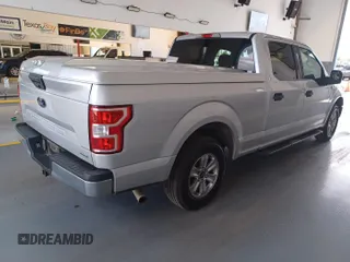 2018 Ford F-150 XL with VIN 1FTEW1CP7JKD24099, listed as a IAAI auction lot 42636640 with 132,076 mi miles and . Bid and sale history available at DreamBid. Image 1.