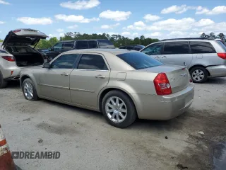 2009 Chrysler 300 Touring with VIN 2C3KA53V69H592639, listed as a Copart auction lot 55209775 with 107,751 mi miles and Salvage Title. Bid and sale history available at DreamBid. Image 2.