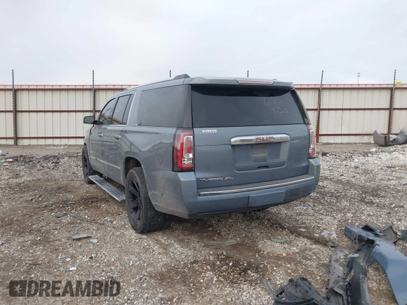 2015 GMC Yukon XL Denali with VIN 1GKS2JKJ3FR616122, listed as a IAAI auction lot 41415642 with Not Provided miles and . Bid and sale history available at DreamBid. Image 3.