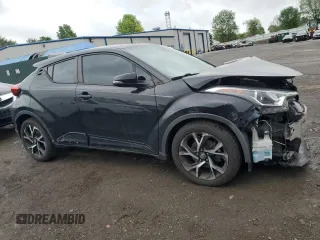 2018 Toyota C-HR XLE with VIN NMTKHMBX9JR058267, listed as a Copart auction lot 55808055 with 102,251 mi miles and Clean Title. Bid and sale history available at DreamBid. Image 4.