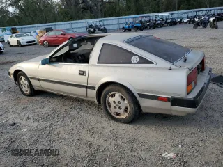 1984 Nissan 300ZX z VIN JN1HZ16S5EX016042, wystawiony jako Copart lot #86071904 z przebiegiem Nie podano mil oraz Szkoda całkowita • Salvage title. Historia ofert i sprzedaży dostępna na DreamBid. Obrazek 2.