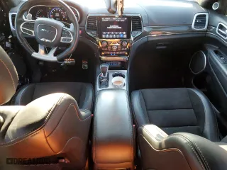 2021 Jeep Grand Cherokee SRT with VIN 1C4RJFDJ5MC718125, listed as a Copart auction lot 88736945 with 54,553 mi miles and Salvage Title. Bid and sale history available at carsss.com. Image 8.