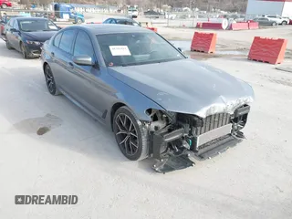 2023 BMW 5 Series 530i xDrive with VIN WBA13BJ04PCL98504, listed as a IAAI auction lot 41702411 with 27,830 mi miles and . Bid and sale history available at DreamBid. Image 1.