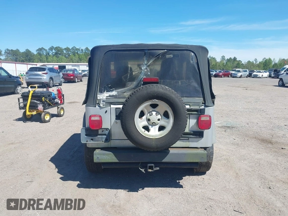 2006 Jeep Wrangler X with VIN 1J4FA39S86P743660, listed as a IAAI auction lot 41890339 with 198,099 mi miles and . Bid and sale history available at DreamBid. Image 16.