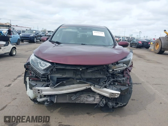 2019 Honda CR-V EX with VIN 7FARW2H56KE053022, listed as a IAAI auction lot 41848570 with 128,676 mi miles. Bid and sale history available at carsss.com. Image 6.