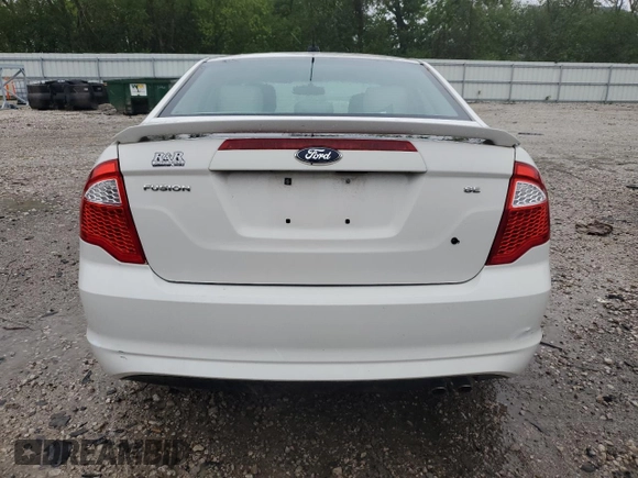 2012 Ford Fusion SE z VIN 3FAHP0HA4CR185059, wystawiony jako Copart lot #56875985 z przebiegiem 173 644 mil mil oraz Nie do naprawy. Historia ofert i sprzedaży dostępna na DreamBid. Obrazek 6.