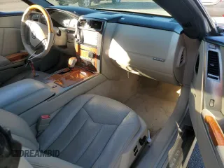 2006 Cadillac XLR z VIN 1G6YV36AX65603770, wystawiony jako Copart lot #81527954 z przebiegiem 59 498 mil mil oraz Szkody całkowita. Historia ofert i sprzedaży dostępna na DreamBid. Obrazek 8.