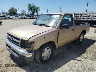 1999 Toyota Tacoma z VIN 4TANL42N9XZ410181, wystawiony jako Copart lot #56991625 z przebiegiem 144 079 mil mil oraz Szkoda całkowita • Salvage title. Historia ofert i sprzedaży dostępna na DreamBid. Obrazek 1.