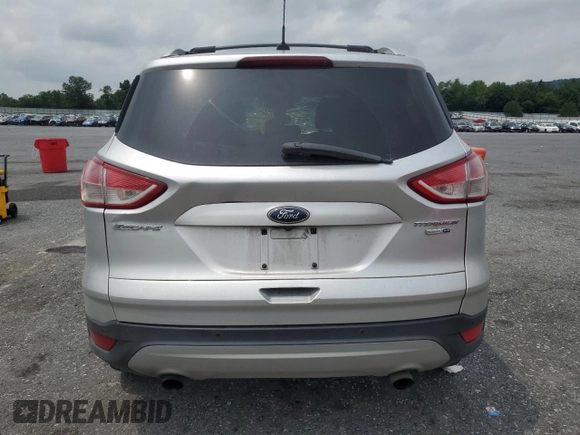 2013 Ford Escape Titanium with VIN 1FMCU9J9XDUB88989, listed as a Copart auction lot 64994445 with 192,833 mi miles and Salvage title. Bid and sale history available at DreamBid. Image 6.