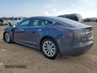 2017 Tesla Model S 100D with VIN 5YJSA1E27HF180483, listed as a Copart auction lot 62783205 with 55,744 mi miles and Salvage title. Bid and sale history available at DreamBid. Image 2.