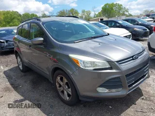 2013 Ford Escape SE with VIN 1FMCU0GX6DUB47180, listed as a IAAI auction lot 42029346 with 147,740 mi miles. Bid and sale history available at carsss.com. Image 1.