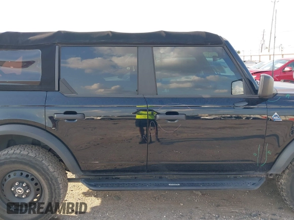 2022 Ford Bronco z VIN 1FMEE5BP3NLA74562, wystawiony jako IAAI lot #42338666 z przebiegiem 20 743 mil mil oraz . Historia ofert i sprzedaży dostępna na DreamBid. Obrazek 13.