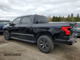 2024 Ford F-150 Lightning XLT z VIN 1FTVW3LK0RWG05326, wystawiony jako Copart lot #55842435 z przebiegiem 23 914 mil mil oraz Czysty tytuł • Clean title. Historia ofert i sprzedaży dostępna na DreamBid. Obrazek 2.