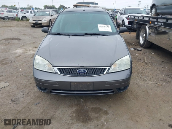 2007 Ford Focus S z VIN 1FAFP37N07W343784, wystawiony jako IAAI lot #42036642 z przebiegiem 223 104 mil mil oraz . Historia ofert i sprzedaży dostępna na DreamBid. Obrazek 6.